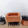 Ellen Zimmermann-Wendt: Das Blaue vom Himmel am Boden zerstört, Ton und Nägel, dreiteilig, 16 × 40 × 18 cm